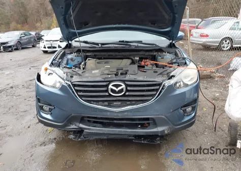 2016 Mazda Cx-5 Touring z USA, uszkodzony, nr VIN JM3KE4CY5G0693345